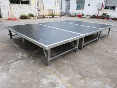 Lightweight portable stages with folding legs
