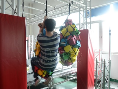 CARGO TUBE NET WITH BALLS–Ninja Obstacle Elements