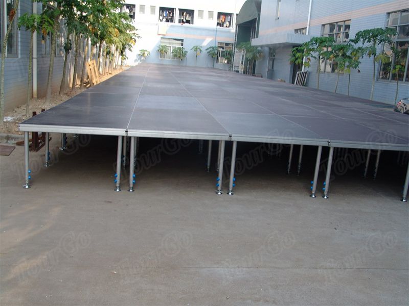 TourGo portable retractable stage platform quick and easy set up plywood match four legs Stage