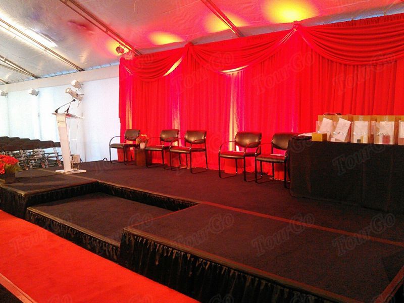 TourGo Portable Stage Platform with Red Stage Backdrop for Event